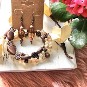 Gorgeous bronze/peach earrings and bracelet set.